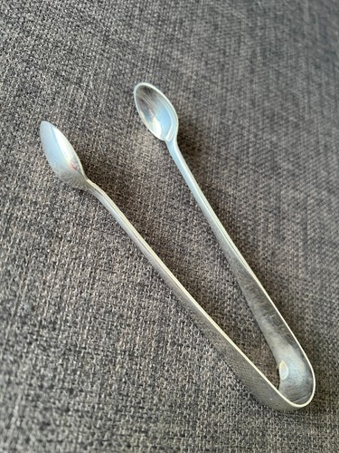 Silver sugar tongs - , long
