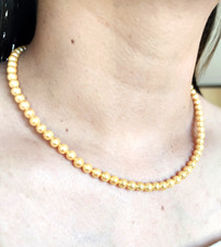 Ivory gold pearl necklace