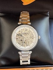 Ladies Stuhrling Full Skeleton Silver Watch, With Halo Of Crystals Round Face