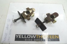 WK 125 SPORT  REAR WHEEL TENSIONERS x 2   YELLOW 13 BREAKERS  (CON-D)