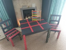 Childs Hand Painted Play Table With Two Solid Wood School Chairs.