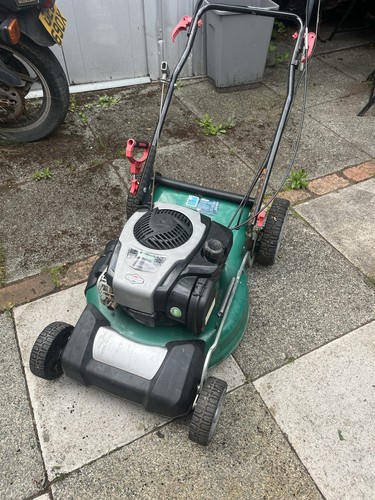 Qualcast petrol mower with - petrol,