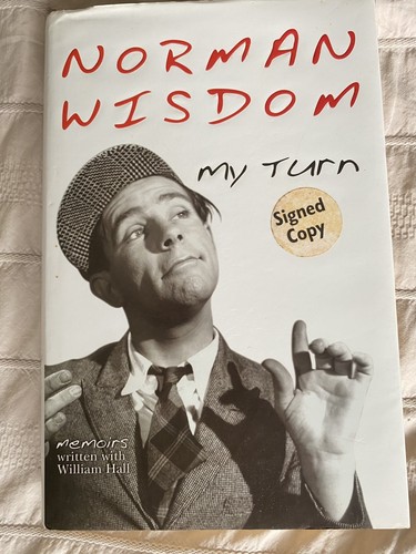 Sir norman wisdom e - wisdom, hand