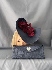 Beautiful blue Fascinator with burgundy flowers and Matching Clutch Bag