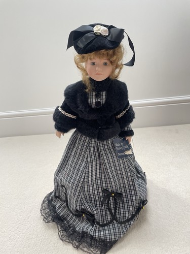 Collectible porcelain doll - collectible,