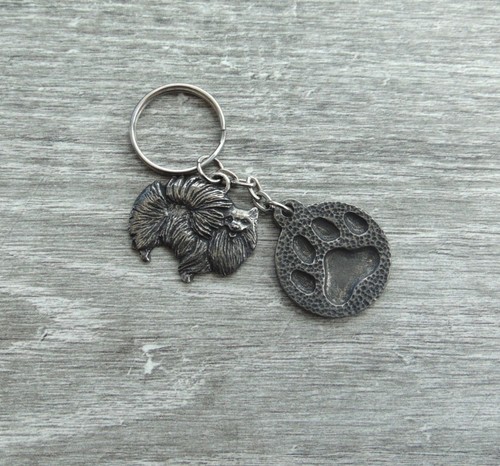 Pomeranian dog paw print - pomeranian,