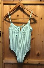 Chic low back, high leg stripped swimming one piece 