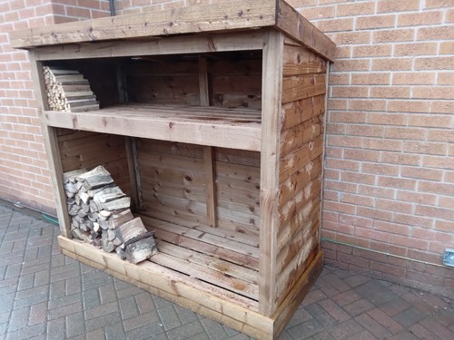 Wooden log firewood store - /,