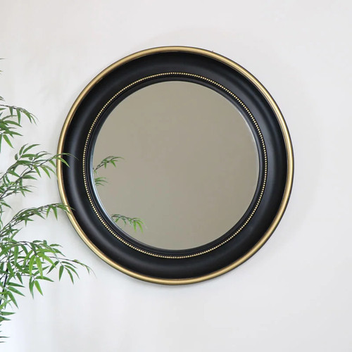 Round black gold wall mirror