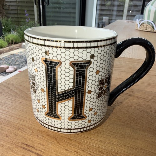 Anthropologie monogram - “s”,