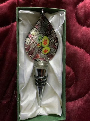 Glass metal wine bottle - &,