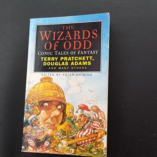 The wizards odd paperback - wizards, of