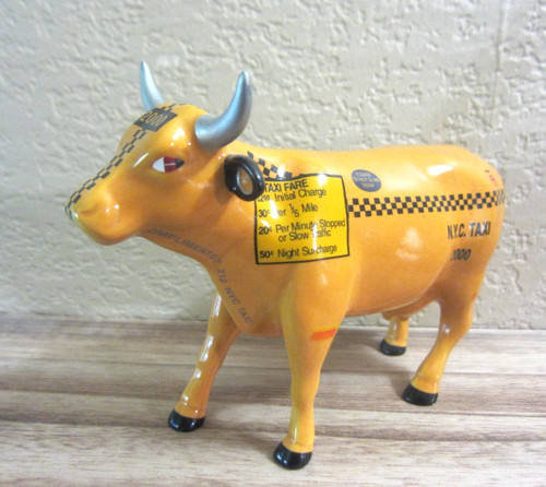 Vintage cow parade nyc taxi - cow,