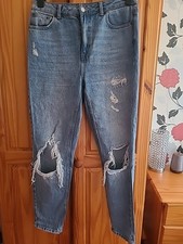 Ladies mom jeans by topshop. Size 30 waist  and 32 Leg. Ripped look