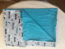 Child's duvet cover and pillowcase set, rabbit in race car design. Zip closing.