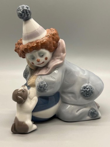 Lladro pierrot with puppy and - with,