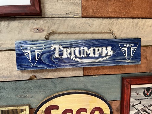 Triumph motorcycle sign - motorcycle,