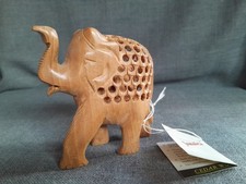 Hand-carved wooden elephant figurine
