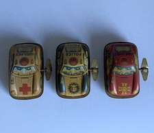 COLLECTIBLE TIN RUSS BERRIE WIND UP FIRE CHIEF ,AMBULANCE,POLICE TOY CARS LOT