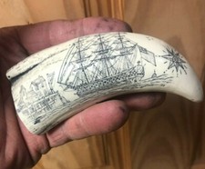 Scrimshaw whale tooth
