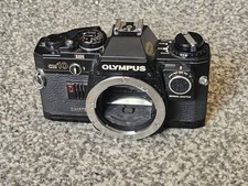 Olympus OM10 Quartz  + Manual