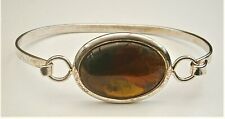 L835)  Kiln fired enamel and silver tone hinged clip on bracelet bangle