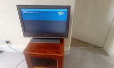 SONY  TELEVISION AND MAHOGANY STAND