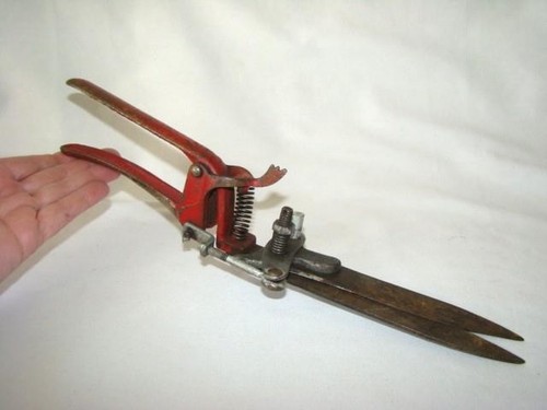 Primitive 1950s red cast iron - primitive,