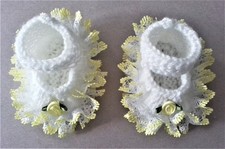 Hand knitted dolls clothes