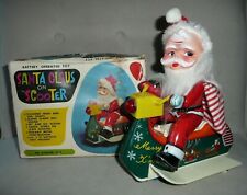Santa Claus on Scooter Tin