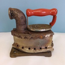 Charcoal iron with ironing