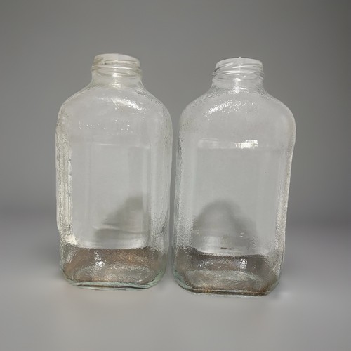 Clear glass milk bottles half - glass,