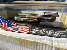 Gold plated Thrust SSC model with signed photo of R Noble & A Green with car