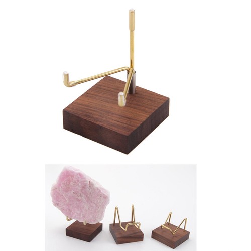 Brass arm wooden base display - wooden,