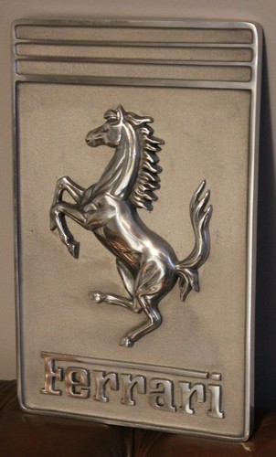 Metal ferrari showroom wall - metal,