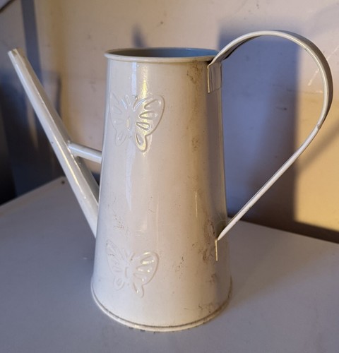 Rustic farmhouse watering can - watering,