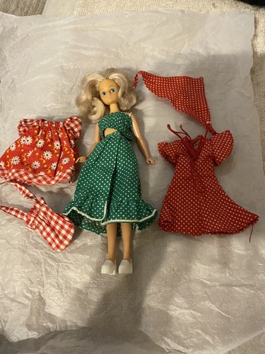 Daisy doll wearing the dot - on,