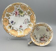 Rockingham Works Brameld Georgian porcelain teacup and saucer floral gilt c1830