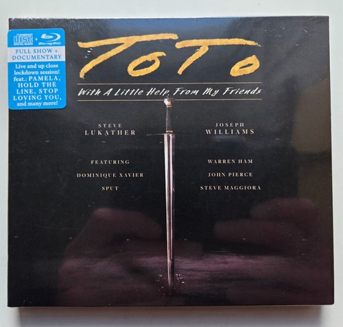 Toto with little help from - little,
