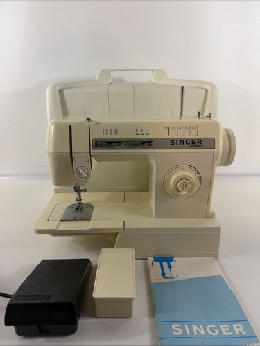 Singer sewing machine model - machine,
