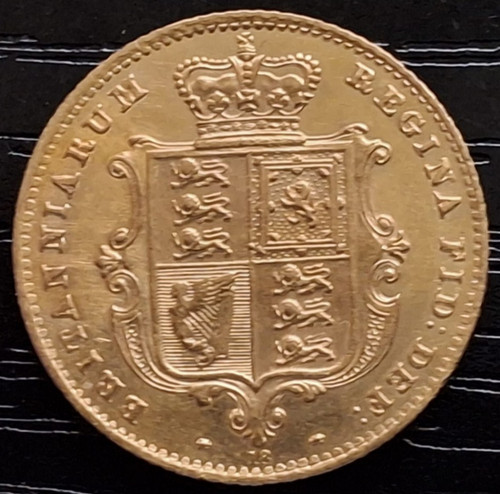 22ct gold half sovereign - half,