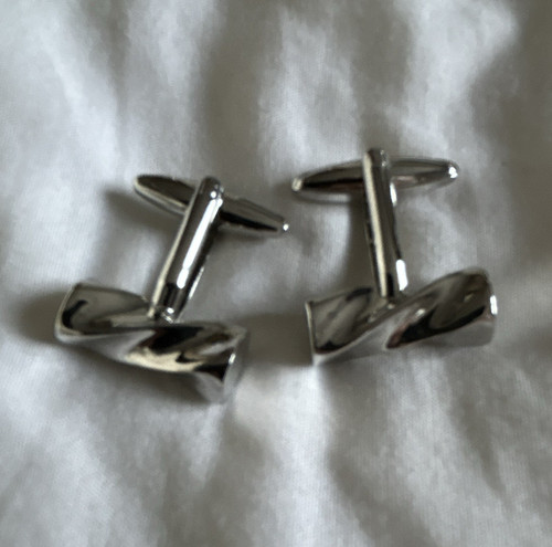Silver tone metal twist - tone,