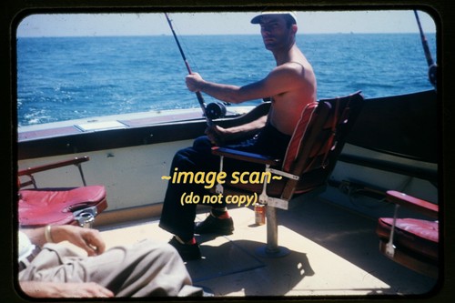 Man deep sea fishing boat - man, on