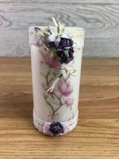 White Pillar Candle With Lace Trim And Purple Paper Flowers 