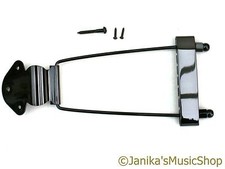 Black trapeze tailpiece tail