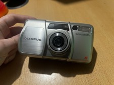 Olympus superzoom 80s point &