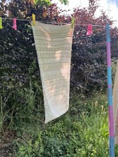 Long Cushion Cover. White And Beige Stripes. White Fluffy Bobbles.