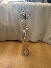 Lady in Dress Posing Statue