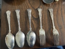 silver-plated spoons and forks