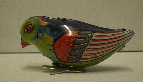 Vintage clockwork pecking bird - pecking,